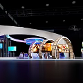 Modern Exhibition Booth in Changchun Northeast Asia Region with Curved Structure and Blue Lighting