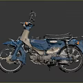 Blue Classic Motorcycle With Black Seat And Shiny Wheels On Dark Background