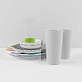 Modern Dinnerware Set Featuring Striped Polka Dot Plates And Colorful Base Glasses With Text