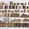 Various Natural Stone and Wood Materials Including Stacked Logs and Textured Stones