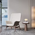 Modern Accent Chair With Wooden Legs And Small Side Table Near Window With Lake View