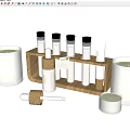 ECO Labeled Daily Cleaning Products With Glass Bottles Candles And Wooden Rack