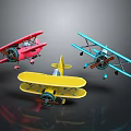 Colorful Toy Biplanes In Red Yellow Blue Arranged On Dark Background