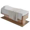 Modern Massage Bed with Wooden Base White Sheets and Soft Blanket