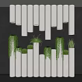 Bonsai Potted Plants in White Cylindrical Containers on Dark Wall with Hanging Greenery and Lighting