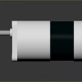 Electric Motor With Silver Metal Casing Green Component And Rotating Shaft