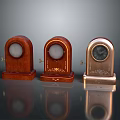 Three Classic Table Clocks Featuring Wooden Metal Bases And Decorative Details