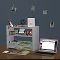 White Bookcase with Books Alarm Clock Photo Frame Colorful Markers and Headphones Near Laptop