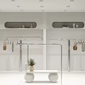Modern White Clothing Store With Arched Doorway Glass Doors And Green Plants