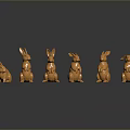 Six Copper Colored Rabbit Sculptures In Various Poses With Black Background Reflections