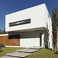 Modern White Detached Villa With Lush Trees Black Car And Stone Steps