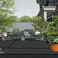 Traditional Garden Landscape With Rockery Water Feature Green Plants And Paved Courtyard