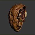 Peeled Walnut With Split Shell And Exposed Fresh Kernel On Dark Surface