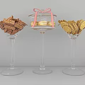 Assorted Cookies And Pastries On Glass Pedestal Trays With Pink Bow Decoration