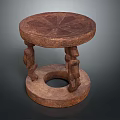Decorative Wooden Stool With Round Carved Top And Ornate Base Design