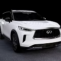 White Infiniti SUV With Sleek Design And Black Accents On Gray Floor