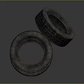 Decorative Ornament Set with Three Stacked Tires and One Tilted Tire