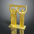 Golden Statue Of Two Men Holding A Sword Together On Base