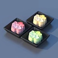 Colorful Pastries With Decorative Patterns Served On Black Square Plates