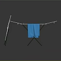 White Clothes Drying Rack with Green Stand Hanging Blue Towel for Drying