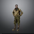 Man In Yellow Jacket Green Pants And Brown Boots Standing With Hands On Hips