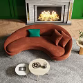 Modern Curved Orange Sectional Sofa With Green Cushion And Fireplace On Green Wall