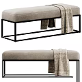 Modern Beige Upholstered Sofa Bench With Black Metal Frame And Throw Blanket