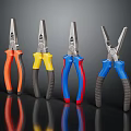Different Colored Handle Pliers With Metallic Heads On Reflective Surface