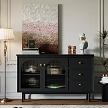 Black Sideboard with Mesh Doors Three Drawers Books and Sculptures with Wall Painting Floor Lamp