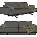 Stylish Gray Two Seater Sofa With Soft Pillows And Cozy Blanket On Black Legs