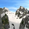 Snow Covered Mountain Landscape With Rocky Cliffs Green Vegetation And Blue Sky