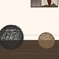Decorative Ornament Set with Silver and Gold Wire Spheres and Open Book on Wooden Floor