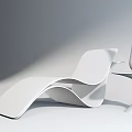 Sleek Modern White And Gold Lounge Chair With Curved Design And Gold Cone Decor