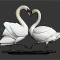 Two White Swans Face to Face Forming Heart Shape on Black Platform with Grey Background