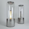 Two Modern Table Lamps With Transparent Glass Shade And Metal Base Design