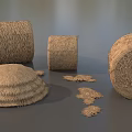 Round Hay Bales And Scattered Hay Piles In Natural Rural Setting