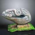 Ancient Mythical Creature Stone Carving With Intricate Patterns On Green Base