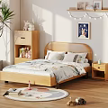 Wooden Kids Bed with Patterned Bedding Pillows Nightstand Lamp Bookshelf Wall Art and String Lights