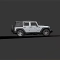 White Jeep With Black Soft Top Open Doors On Gray Pavement