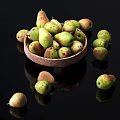 Fresh Ripe Pears in Wooden Bowl with Scattered Ones on Black Background