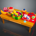 Colorful Toy Food Display On Table With Banana Watermelon Cake Ice Cream Cups And Drinks