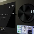 Black Audio Amplifier With Knobs Display Screen Control Panel And Ports