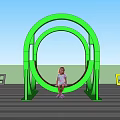 Green Circular Outdoor Chair On Beach With Ocean Blue Sky And Kids Relaxing