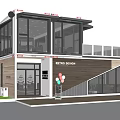 Two Story Container Storefront With Large Windows Wooden Panels And Balloons Exterior Design