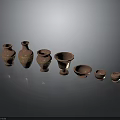 Reddish Brown Ceramic Vases And Pots With Golden Decorations In Various Sizes