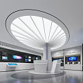 Modern Exhibition Hall Featuring Multiple Display Screens Central White Reception Desk and Tech Inspired Design