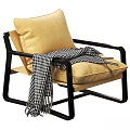Stylish Modern Leisure Chair with Black Frame Beige Cushion and Black White Checkered Blanket