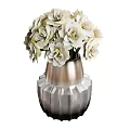 Elegant Floral Display With White Flowers In Silver Textured Geometric Vase