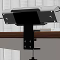 Sturdy Black Metal Shelf Bracket Supporting Electronic Device On Wooden Tabletop