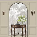 Entryway Cabinet Sideboard With Arched Tree Patterned Wallpaper Brass Candle Wall Sconces And Angel Figurine